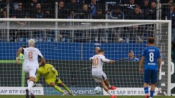 Soccer Football - Bundesliga - TSG 1899 Hoffenheim v Bayer Leverkusen - PreZero Arena, Hoffenheim, Germany - September 14, 2024 Bayer Leverkusen's Florian Wirtz scores their third goal past TSG 1899 Hoffenheim's Oliver Baumann from the penalty spot REUTERS/Heiko Becker DFL REGULATIONS PROHIBIT ANY USE OF PHOTOGRAPHS AS IMAGE SEQUENCES AND/OR QUASI-VIDEO.