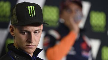 Quartararo con Márquez tras él.