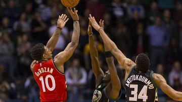 Nov 25, 2016; Milwaukee, WI, USA; Toronto Raptors guard DeMar DeRozan (10) shoots during the fourth quarter against the Milwaukee Bucks at BMO Harris Bradley Center. Toronto won 105-99. Mandatory Credit: Jeff Hanisch-USA TODAY Sports