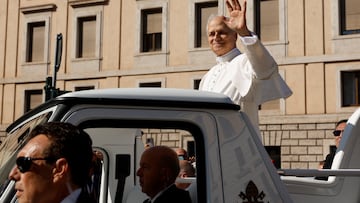 Pope Leo XIV arrives on the popemobile for his inaugural Mass at the Vatican, as seen from Rome May 18, 2025. REUTERS/DARRIN ZAMMIT LUPI