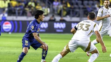 Alejandro Zendejas (L) of America fights for the ball with Aaron Long (R) of Los Angeles during the match between Los Angeles FC and America as part of the friendly match, at Banc of California Stadium on February 11, 2025 in Los Angeles, California, United States.