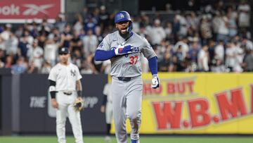 Jun 8, 2024; Bronx, New York, USA;  Los Angeles Dodgers right fielder Teoscar Hernandez (37) celebrates while running the bases after his grand slam home run during the eighth inning against the New York Yankees at Yankee Stadium. Mandatory Credit: Vincent Carchietta-USA TODAY Sports