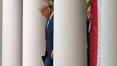 US President Donald J. Trump and Vice President Mike Pence arrive to give an update on the nation&#039;s Coronavirus Testing Strategy, in the Rose Garden of the White House, in Washington, DC. 