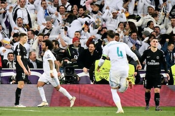 Paris Saint-Germain players Marco Verratti (right) and Thomas Meunier (left) look on in dejection as Marcelo (second left) and Sergio Ramos celebrate Real Madrid's third goal on Wednesday.