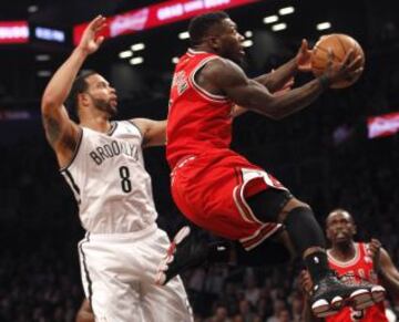 Nate Robinson y Deron Williams.