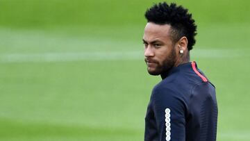 Paris Saint-Germain's Brazilian forward Neymar looks on as he takes part in a training session in Saint-Germain-en-Laye, west of Paris, on August 17, 2019, on the eve of the French L1 football match between Paris Saint-Germain (PSG) and Rennes. (Phot