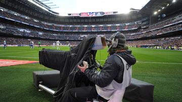 MADRID, SPAIN - FEBRUARY 15:  A Mediapro television cameraman films  the La Liga match between Real Madrid CF and RC Deportivo La Coruna at Estadio Santiago Bernabeu on February 15, 2015 in Madrid, Spain. La Liga clubs are threatening to go on strike if t