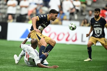 Aug 7, 2024; Vancouver, British Columbia, CAN;  Vancouver Whitecaps FC forward Fafa Picault (11) battles for the ball against Pumas UNAM defender Lisandro Magallan (4) during the second half at BC Place. Mandatory Credit: Anne-Marie Sorvin-USA TODAY Sports