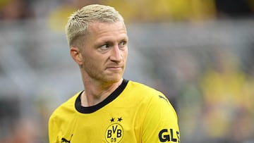 Dortmund's German forward #11 Marco Reus reacts during the German first division Bundesliga football match between Borussia Dortmund and VfL Wolfsburg in Dortmund, western Germany, on September 23, 2023. (Photo by INA FASSBENDER / AFP) / DFL REGULATIONS PROHIBIT ANY USE OF PHOTOGRAPHS AS IMAGE SEQUENCES AND/OR QUASI-VIDEO