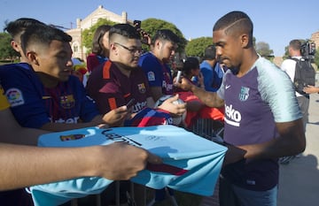 Malcom signs autographs after the session at UCLA