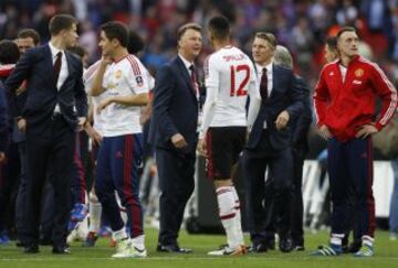 Louis van Gaal and Chris Smalling celebrate