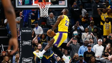 Apr 12, 2024; Memphis, Tennessee, USA; Los Angeles Lakers forward LeBron James (23) dunks during the second half against the Memphis Grizzlies at FedExForum. Mandatory Credit: Petre Thomas-USA TODAY Sports
