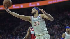 Dec 21, 2019; Philadelphia, Pennsylvania, USA;  Philadelphia 76ers guard Ben Simmons (25) grabs a rebound during the second quarter of the game against the Washington Wizards at the Wells Fargo Center. Mandatory Credit: John Geliebter-USA TODAY Sports