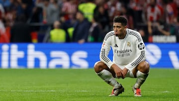 Real Madrid's English midfielder #05 Jude Bellingham reacts during the Spanish league football match between Club Atletico de Madrid and Real Madrid CF at the Metropolitano stadium in Madrid on September 29, 2024. (Photo by OSCAR DEL POZO / AFP)