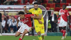 Monaco's French forward #7 Eliesse Ben Seghir (L) and Nantes' Swiss defender #24 Eray Ervin Comert fight for the ball during the French L1 football match between AS Monaco and FC Nantes at the Louis II Stadium (Stade Louis II) in the Principality of Monaco on May 19, 2024. (Photo by Nicolas TUCAT / AFP)
