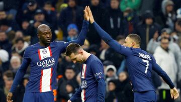 Soccer Football - Ligue 1 - Olympique de Marseille v Paris St Germain - Orange Velodrome, Marseille, France - February 26, 2023 Paris St Germain's Kylian Mbappe celebrates scoring their third goal with Lionel Messi and Danilo Pereira REUTERS/Eric Gaillard