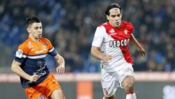 Radamel Falcao Garcia Zarate of AS Monaco vies for the ball with Morgan Sanson of Montpellier HSC during their French Ligue 1 match AS Monaco vs Montpellier HSC at La Mosson stadium, Montpellier, France, 10 January 2014. 