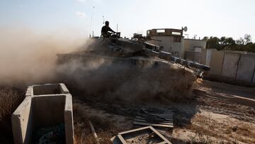 An Israeli tank maneuvers near the Israel-Gaza border, amid the Israel-Hamas conflict, in Israel, July 14, 2024. REUTERS/Amir Cohen