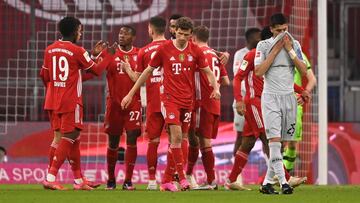 MUNICH, GERMANY - APRIL 20: Eric Maxim Choupo-Moting of FC Bayern Muenchen celebrates with teammates after scoring their team's first goal during the Bundesliga match between FC Bayern Muenchen and Bayer 04 Leverkusen at Allianz Arena on April 20,