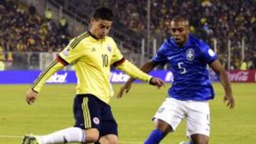 Colombia&#039;s midfielder James Rodriguez and Brazil&#039;s midfielder Fernandinho  in Santiago, Chile, on June 17, 2015. AFP PHOTO / LUIS ACOSTA