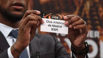 Barcelona and Lyon's former player Eric Abidal shows the name of Atletico Madrid during the draw for the round of 16 of the UEFA Europa League football tournament at the UEFA headquarters in Nyon, Switzerland, on February 23, 2018.
/ AFP PHOTO / je
