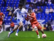 Jose Pachuca (L) of Puebla fights for the ball with Javier Ruiz (R) of Necaxa during the 11th round match between Puebla and Necaxa as part of the Liga BBVA MX Varonil, Torneo Clausura 2026 at Cuauhtemoc Stadium, on March 13, 2026 in Puebla, Mexico.