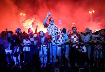 Soccer Football - World Cup - Semi-Final - Croatia v England - Zagreb, Croatia - July 11, 2018. Croatia's fans react after a goal as they watch the broadcast of the World Cup semi-final match between Croatia and England in the fan zone. REUTERS/Antonio Br