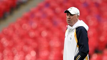 Real Madrid's Italian coach Carlo Ancelotti reacts as he leads a training session at Wembley stadium, in London, on May 31, 2024 on the eve of their UEFA Champions League final football match against Borussia Dortmund. (Photo by INA FASSBENDER / AFP)