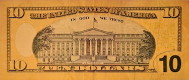 What building is on the back of the 10 dollar bill?