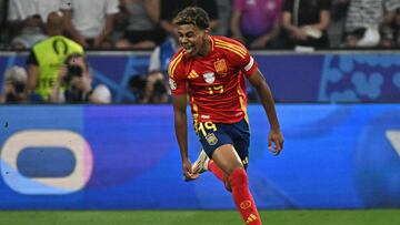 Spain's forward #19 Lamine Yamal celebrates scoring his team's first goal during the UEFA Euro 2024 semi-final football match between Spain and France at the Munich Football Arena in Munich on July 9, 2024. (Photo by JAVIER SORIANO / AFP)