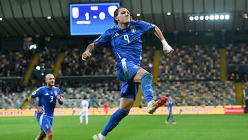 Italy's forward #09 Mateo Retegui celebrates after scoring his team's second goal during the FIFA World Cup 2026 Group I qualification football match between Italy and Israel, at the the Bluenergy Stadium in Udine northeastern Italy, on October 14, 2025. (Photo by Stefano RELLANDINI / AFP)
