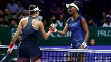 Tennis - WTA Tour Finals - Singapore Indoor Stadium, Singapore - October 26, 2017 USA's Venus Williams shakes hands with Spain's Garbine Muguruza after their group stage match REUTERS/Edgar Su