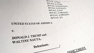 FILE PHOTO: The first page of the U.S. Justice Department's charging document against former U.S. President Donald Trump and his employee Waltine Nauta, charging Trump with 37 criminal counts, including charges of unauthorized retention of classified documents and conspiracy to obstruct justice after leaving the White House, is seen after being released by the Justice Department in Washington, U.S. June 9, 2023.  REUTERS/Jim Bourg/File Photo