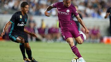 Soccer Football - Real Madrid vs Manchester City - International Champions Cup - Los Angeles, USA - July 26, 2017 Manchester City's Gabriel Jesus in action with Real Madrid's Raphael Varane REUTERS/Lucy Nicholson