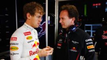 Vettel, junto a Horner.