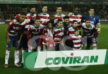 Once del Granada. De pie: El Arabi, Success, Lombán, Edgar, Miguel Lopes, Babín y Andrés. Agachados: Rubén Pérez, Foulquier, Fran Rico y Rochina.