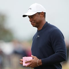 How is Tiger Woods doing at the Open Championship today? Will he make the cut-line?