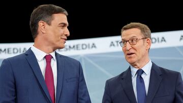 Spanish People's Party candidate Alberto Nunez Feijoo and Spain's Prime Minister and Socialist candidate Pedro Sanchez talk before a televised debate ahead of snap election in Madrid, Spain, July 10, 2023. REUTERS/Juan Medina TPX IMAGES OF THE DAY
