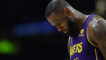 LOS ANGELES, CALIFORNIA - MARCH 22: LeBron James #23 of the Los Angeles Lakers looks on during the second half of a game against the Philadelphia 76ers at Crypto.com Arena on March 22, 2024 in Los Angeles, California. NOTE TO USER: User expressly acknowledges and agrees that, by downloading and/or using this photograph, user is consenting to the terms and conditions of the Getty Images License Agreement.   Sean M. Haffey/Getty Images/AFP (Photo by Sean M. Haffey / GETTY IMAGES NORTH AMERICA / Getty Images via AFP)