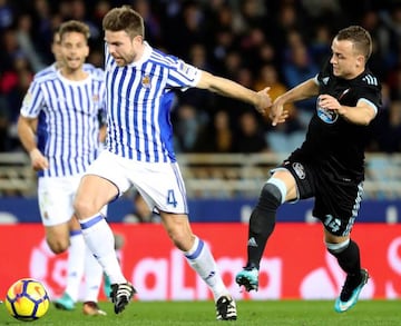 Lobotka (right) tracking Real Sociedad's Asier Illarramendi in a recent match.