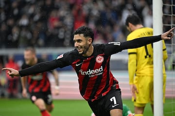 Frankfurt's Egyptian forward #07 Omar Marmoush celebrates after scoring the 2-0 goal during the German first division Bundesliga football match between Eintracht Frankfurt and Borussia Dortmund in Frankfurt am Main, western Germany on October 29, 2023. (Photo by Kirill KUDRYAVTSEV / AFP) / DFL REGULATIONS PROHIBIT ANY USE OF PHOTOGRAPHS AS IMAGE SEQUENCES AND/OR QUASI-VIDEO (Photo by KIRILL KUDRYAVTSEV/AFP via Getty Images)