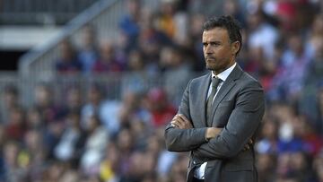Barcelona's coach Luis Enrique looks on during the Spanish league football match FC Barcelona vs Villarreal CF at the Camp Nou stadium in Barcelona on May 6, 2017. / AFP PHOTO / LLUIS GENE