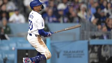 Apr 2, 2024; Los Angeles, California, USA; Los Angeles Dodgers shortstop Mookie Betts (50) watches the flight of the ball on a solo home run for his 1500th career hit in the third inning against the San Francisco Giants at Dodger Stadium. Mandatory Credit: Jayne Kamin-Oncea-USA TODAY Sports