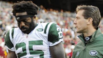 New York Jets running back Joe McKnight leaves the field after an injury