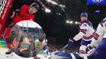 Aficionado es captado viendo el fútbol durante la final de Hockey entre USA y Canadá