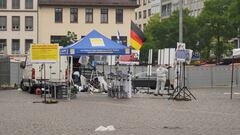 Police investigators work at the scene where a man attacked people at a far right-wing information stand of the Buergerbewegung Pax Europa (BPE) in the central market of the city of Mannheim, Germany, May 31, 2024. REUTERS/Timm Reichert