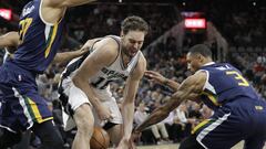 Utah Jazz guard George Hill (3) knocks the ball away from San Antonio Spurs forward Pau Gasol (16) during the first half of an NBA basketball game, Tuesday, Nov. 1, 2016, in San Antonio. (AP Photo/Eric Gay)