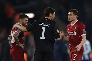 Iker Casillas shakes hads with Liverpool's Alberto Moreno and James Milner on what could turn out to be his final Champions League game at Anfield.