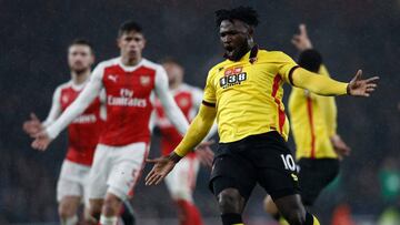 Watford's Nigerian striker Isaac Success (R) reacts during the English Premier League football match between Arsenal and Watford at the Emirates Stadium in London on January 31, 2017.
Watford won the match 2-1. / AFP PHOTO / Adrian DENNIS / RESTRIC
