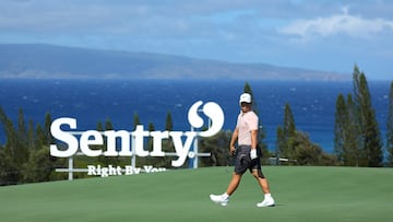 KAPALUA, HAWAII - JANUARY 02: Tom Kim of South Korea walks the 10th green during a practice round prior to The Sentry at Plantation Course at Kapalua Golf Club on January 02, 2024 in Kapalua, Hawaii.   Kevin C. Cox/Getty Images/AFP (Photo by Kevin C. Cox / GETTY IMAGES NORTH AMERICA / Getty Images via AFP)